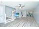 The spacious living room boasts hardwood floors and abundant natural light at 125 Macy Cir, Goose Creek, SC 29445