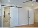 Bright bedroom featuring a bathroom with a stylish sliding door and a modern shower at 1261 Hampshire Rd, Charleston, SC 29412