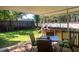 Wooden deck with a table and 4 chairs featuring a nice view of trees and the backyard at 1261 Hampshire Rd, Charleston, SC 29412