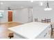 Open-concept kitchen with a large island, stainless appliances, and hardwood flooring at 1261 Hampshire Rd, Charleston, SC 29412