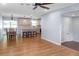 Bright living room featuring hardwood floors and seamless connection to modern kitchen and outdoor dining at 1261 Hampshire Rd, Charleston, SC 29412