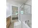 Bright bathroom featuring a glass-enclosed shower, separate soaking tub, and access to the bedroom at 129 Howard Mary Dr # A, Charleston, SC 29412