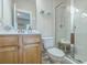 Cozy bathroom featuring a glass-enclosed shower, vanity with sink, decorative beach accents and a toilet at 129 Howard Mary Dr # A, Charleston, SC 29412