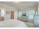 Spacious bedroom featuring neutral walls, bright windows and stylish furniture at 129 Howard Mary Dr # A, Charleston, SC 29412