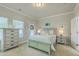 Serene bedroom with light blue furniture, soft bedding, and plenty of natural light at 129 Howard Mary Dr # A, Charleston, SC 29412
