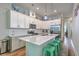 Modern kitchen with white cabinetry, quartz countertops, and stainless steel appliances at 129 Howard Mary Dr # A, Charleston, SC 29412