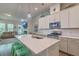 Open-concept kitchen with a center island, stainless steel appliances, and bar seating at 129 Howard Mary Dr # A, Charleston, SC 29412
