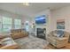 Cozy living room with a fireplace, TV, and comfortable seating at 129 Howard Mary Dr # A, Charleston, SC 29412