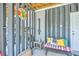 Outdoor patio features a bench with colorful pillows and outdoor shower at 129 Howard Mary Dr # A, Charleston, SC 29412