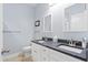 Modern bathroom with a double vanity, granite counters and sleek fixtures at 1300 Enfield Ln, Mount Pleasant, SC 29466