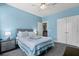 Comfortable bedroom with bed, nightstand, carpeting and great natural light at 1300 Enfield Ln, Mount Pleasant, SC 29466