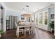 Elegant dining room with natural light, a stylish chandelier, and space for entertaining at 1300 Enfield Ln, Mount Pleasant, SC 29466