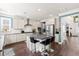 Bright, updated kitchen featuring stainless steel appliances, subway tile backsplash, and island with barstool seating at 1300 Enfield Ln, Mount Pleasant, SC 29466