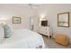Relaxing bedroom featuring a white dresser, neutral walls, and large bed with white bedding at 132 Turnberry Dr, Johns Island, SC 29455