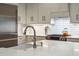 Well-lit kitchen featuring stainless steel appliances, white cabinetry, and a white subway tile backsplash at 132 Turnberry Dr, Johns Island, SC 29455