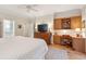 This bedroom features a built in desk and hard wood floors at 132 Turnberry Dr, Johns Island, SC 29455