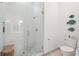 Modern shower with white subway tile, glass enclosure, and sleek fixtures in a bright bathroom at 132 Turnberry Dr, Johns Island, SC 29455