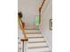 Staircase features wooden handrail and white risers at 132 Turnberry Dr, Johns Island, SC 29455