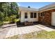 Backyard featuring a charming patio area surrounded by lush greenery at 133 Bramwell Dr, Summerville, SC 29485