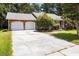 Attractive brick home with a two-car garage, manicured lawn, and charming front entryway at 133 Bramwell Dr, Summerville, SC 29485