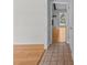 View of the hallway, showcasing hardwood floors, access to other rooms, and potential for seamless transitions at 133 Bramwell Dr, Summerville, SC 29485