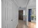 Welcoming entryway with tile flooring, a dark wood door, and ample natural light, perfect for greeting guests at 133 Bramwell Dr, Summerville, SC 29485