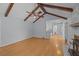 Spacious living room with wood beams and hardwood floors, leading to the kitchen at 133 Bramwell Dr, Summerville, SC 29485