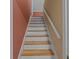 Staircase with wooden treads and white risers leading to the upper level at 133 Bramwell Dr, Summerville, SC 29485