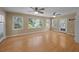 Bright sunroom with hardwood floors, multiple windows, and ceiling fans at 133 Bramwell Dr, Summerville, SC 29485