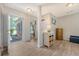 Inviting foyer with a tiled floor, white trim and natural light at 138 Wainwright Manor, Summerville, SC 29485