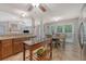 Bright and open kitchen features granite countertops, stainless appliances and an island at 138 Wainwright Manor, Summerville, SC 29485