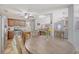 Spacious kitchen with stainless steel appliances and island opens to a cozy living area at 138 Wainwright Manor, Summerville, SC 29485