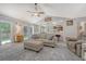 Bright and spacious living room featuring vaulted ceilings, an open floor plan, and wood-look flooring at 138 Wainwright Manor, Summerville, SC 29485