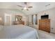 Main bedroom with vaulted ceiling, dresser, and attached bathroom at 138 Wainwright Manor, Summerville, SC 29485
