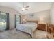 Main bedroom with vaulted ceilings, ceiling fan, and large windows at 138 Wainwright Manor, Summerville, SC 29485