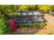 Overhead view of a home that has a screened-in porch and a colorful bush in the front yard at 1518 Southwick Dr, Johns Island, SC 29455