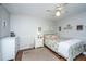 Comfortable bedroom featuring a ceiling fan, bright floral comforter, and wood flooring at 1518 Southwick Dr, Johns Island, SC 29455