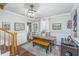Inviting dining room featuring a classic wood table, bench, and stylish light fixture at 1518 Southwick Dr, Johns Island, SC 29455