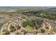 A sprawling community featuring ponds, verdant trees, and well-maintained streets from an aerial perspective at 1536 Keshi Pearl Dr, Mount Pleasant, SC 29466