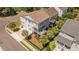 Aerial view of a beautiful home with a well-maintained yard, lush landscaping, and inviting curb appeal at 1536 Keshi Pearl Dr, Mount Pleasant, SC 29466