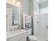 Bright bathroom with white vanity, modern fixtures, and glass-enclosed shower at 1536 Keshi Pearl Dr, Mount Pleasant, SC 29466