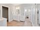 Bright bathroom with white vanity, a walk-in glass shower, and a doorway leading to a bedroom area at 1536 Keshi Pearl Dr, Mount Pleasant, SC 29466