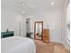 Bright bedroom with white walls, light wood furniture, and lots of natural light at 1536 Keshi Pearl Dr, Mount Pleasant, SC 29466