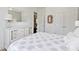 Serene bedroom features a dresser, ample closet space, and calm decor for a relaxing retreat at 1536 Keshi Pearl Dr, Mount Pleasant, SC 29466