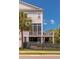Beautiful two-story home featuring a screened-in porch, elevated deck, and a fenced yard at 1536 Keshi Pearl Dr, Mount Pleasant, SC 29466