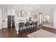 This kitchen features a large island with seating, stainless steel appliances, and pendant lighting at 1536 Keshi Pearl Dr, Mount Pleasant, SC 29466