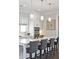 Bright kitchen featuring a large island, pendant lighting, and modern stainless steel appliances at 1536 Keshi Pearl Dr, Mount Pleasant, SC 29466