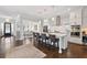 Spacious kitchen boasts stainless appliances, a large island with seating and easy access to the dining area at 1536 Keshi Pearl Dr, Mount Pleasant, SC 29466