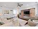 Spacious living room boasting ample seating, a large entertainment center, and an open layout; ideal for modern living at 1536 Keshi Pearl Dr, Mount Pleasant, SC 29466