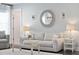 Inviting living room showcases a comfortable sofa, decorative accents, and ample lighting for a cozy atmosphere at 1536 Keshi Pearl Dr, Mount Pleasant, SC 29466